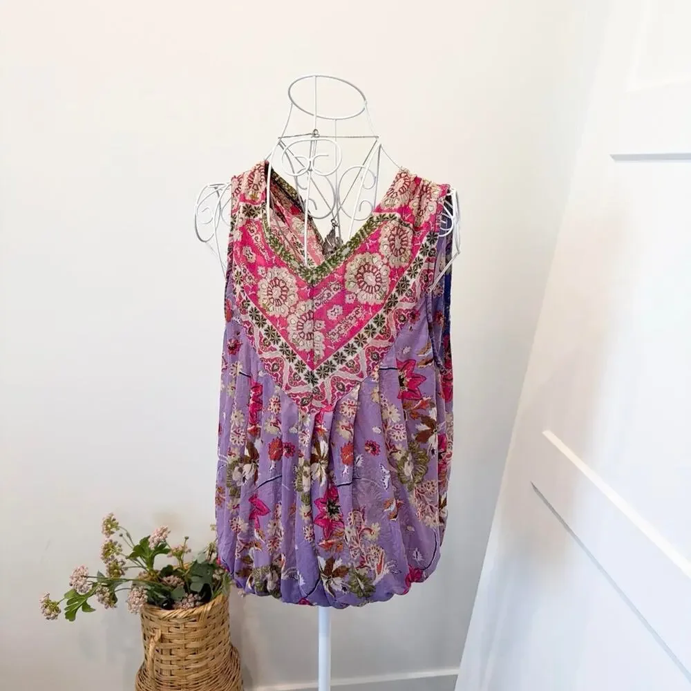 The prettiest free people boho floral gathered wrap v neck blouse